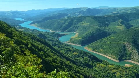 Vine-covered slopes frame distant. Kozji Kamen viewpoint, Serbia 스톡 동영상 342340164