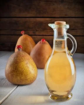 Vinegar of pears Stock Photos