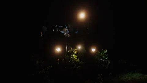 Vineyard tractor works late at night to prepare for grape harvest season Stock Footage 321367022