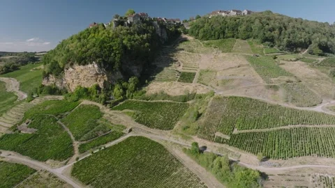 Vineyard view of Chateau Chalon perched village on a rocky cliff, Jura, Franc Stock Footage 341881936