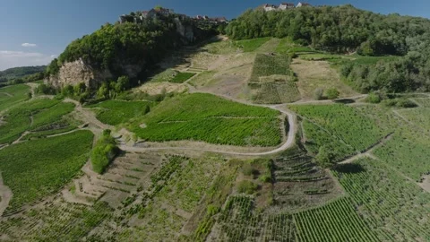Vineyard view of Chateau Chalon perched village on a rocky cliff, Jura, Franc Stock Footage 341881964