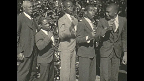 Vintage 16mm film, 1935 Orlando, all male African-American singing group Stock Footage