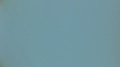 Vintage 16mm Kodak 500T film scan with grain and organic light leaks. Stock Footage 305632155