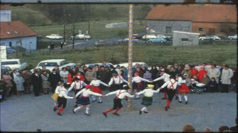 Vintage 8 mm film: Rural funfair, dancing around maypole, Germany, 1960s Stock Footage
