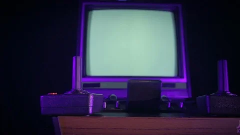 Vintage '80s Atari Video Game Console and TV set slider Stock Footage 124678949