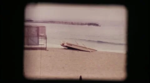Vintage 8mm. Boat on a empty beach in winter Video stock 18174685