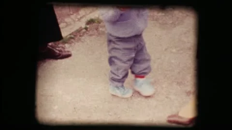 Vintage 8mm. First steps of a child Stock Footage 18174683