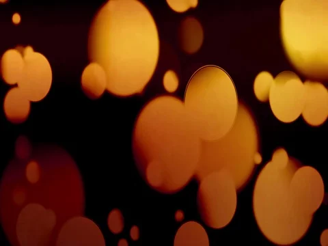 Vintage abstract circular yellow gradient glitter bokeh flowing on black back Video stock 80540081
