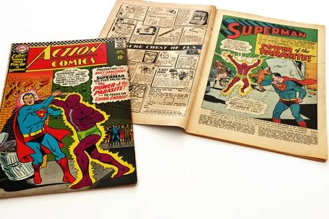 Vintage Action Comics by DC Comics featuring Superman and Supergirl Stock Photos