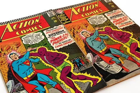 Vintage Action Comics by DC Comics featuring Superman and Supergirl Stock Photos