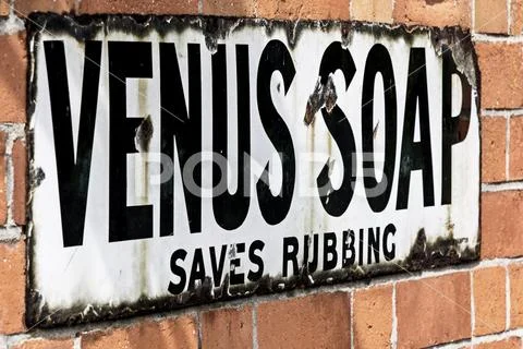 Vintage advertising sign for Venus Soap Stock Photos