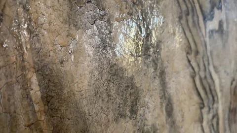 Vintage Aged Stone Wall Texture with Glossy Marble-Like Veins, Close-Up Vídeos de archivo 332087297