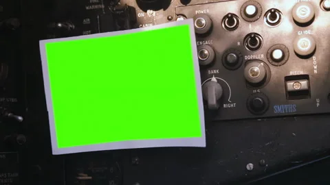 Vintage Aircraft Instrument Panel with Empty Green Screen Photo Frame - 4K Stock Footage 336685142