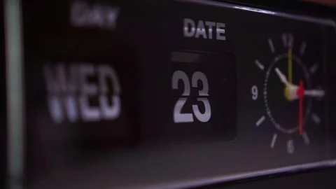 Vintage alarm clock ticking, second hand moving, flip day date display, Stock Footage 344011395