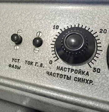 Vintage Analog Control Panel with Black Knobs and Russian Text. Stock Photos