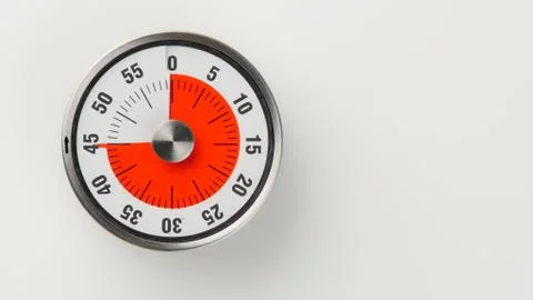 Vintage analog kitchen countdown timer, 45 minutes remaining Stock Photos