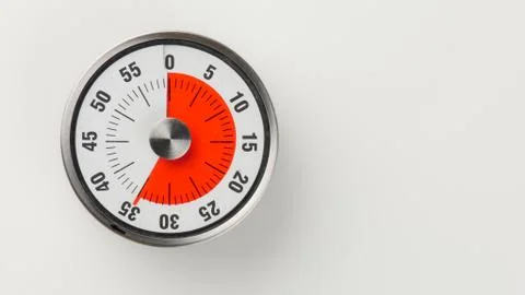 Vintage analog kitchen countdown timer, 35 minutes remaining Stock Photos