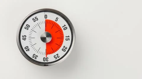 Vintage analog kitchen countdown timer, 30 minutes remaining Stock Photos