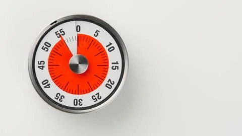 Vintage analog kitchen countdown timer, 55 minutes remaining Stock Photos
