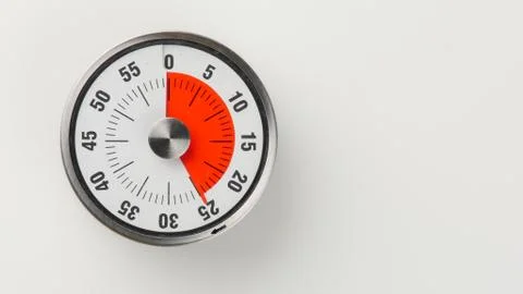 Vintage analog kitchen countdown timer, 25 minutes remaining Stock Photos