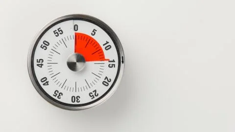 Vintage analog kitchen countdown timer, 14 minutes remaining Stock Photos