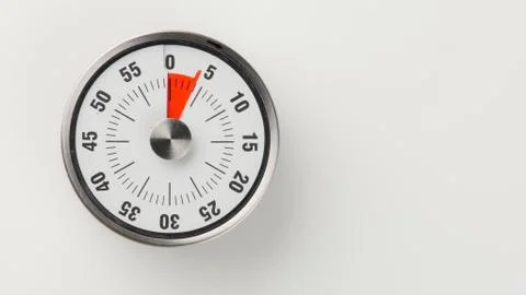 Vintage analog kitchen countdown timer, 4 minutes remaining Stock Photos