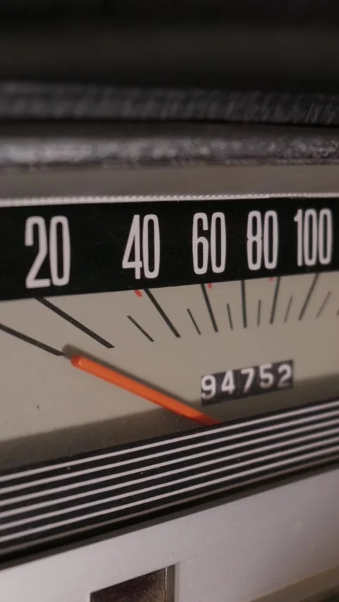 Vintage Analog Speedometer with Orange Needle on Classic Car Dashboard Stock Footage 335644019
