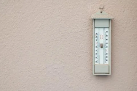 Vintage analog thermometer. Stock Photos