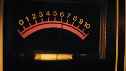 Vintage Audio VU Meter Needle Fluctuating on Backlit Scale Stock Footage 329915937