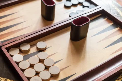 Vintage backgammon table game, clode-up photo Stock Photos