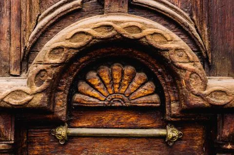 Vintage background. Elements of an old carved wooden door decorated with Foto stock