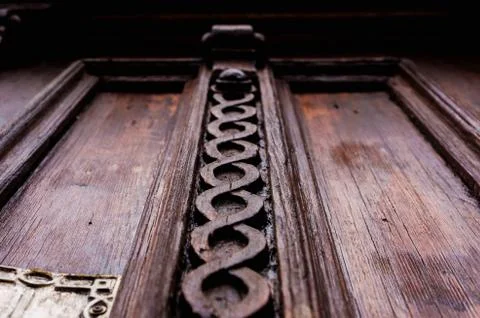 Vintage background. Elements of an old carved wooden door decorated with Stock Photos