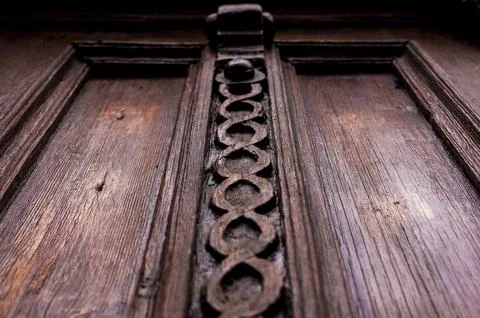 Vintage background. Elements of an old carved wooden door decorated with Fotos de archivo