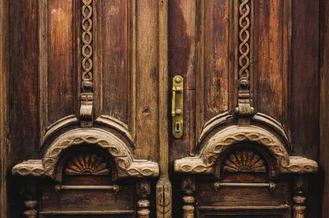 Vintage background. Elements of an old carved wooden door decorated with Fotos de archivo