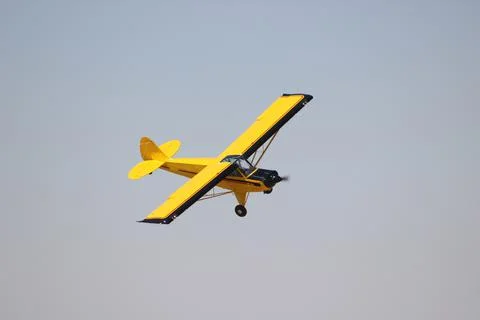 Vintage biplane does loop stunt with smoke trails. airplane air Stock Photos