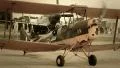 Vintage biplane on ground, airport stylized for World War 2 HD Footage