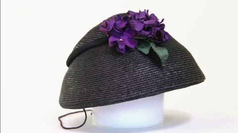 Vintage black straw hat with a artificial flowers Stock Footage 313587075