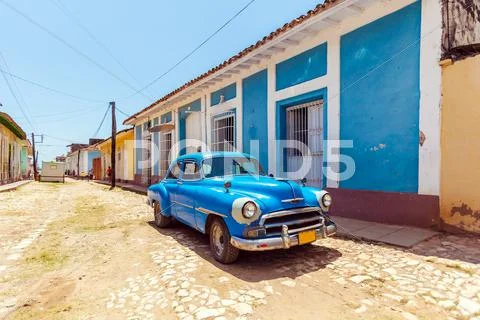 Vintage Blue Car Near Houses In The Old Town, Trinidad