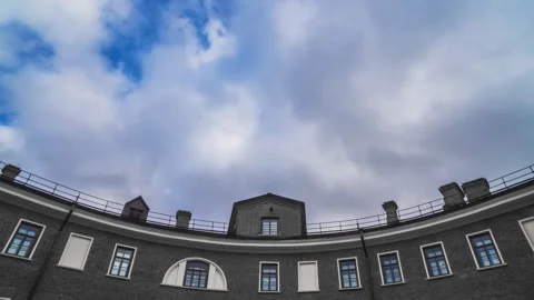 Vintage brick house with white frames. large windows, in black and white. Stock Footage 254973146