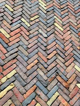 Vintage Brick Pavement in Herringbone Pattern Stock Photos