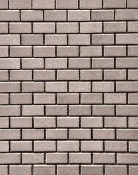 Vintage Brick Wall Showcasing Subtle Cracks And Faded Weather Marks Stock Photos