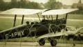 Vintage British biplane G-APMX steering on ground at airport HD Footage