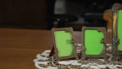 Vintage bronze picture frames with an ancient inkwell FDV 動画素材 120791446