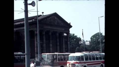 Vintage Buses in Front of Building Stock Footage 278410012