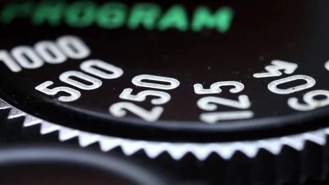 Vintage camera control ring. Shutter speed dial rotation. Film camera settings Stock Footage 294316604