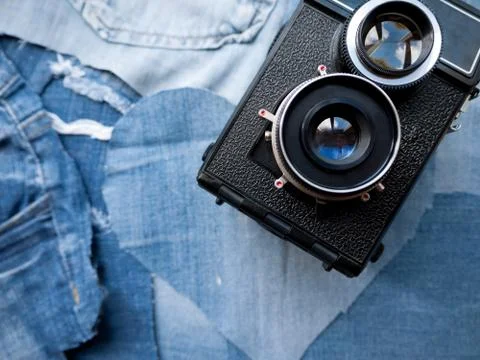 Vintage Camera on Denim Stock Photos