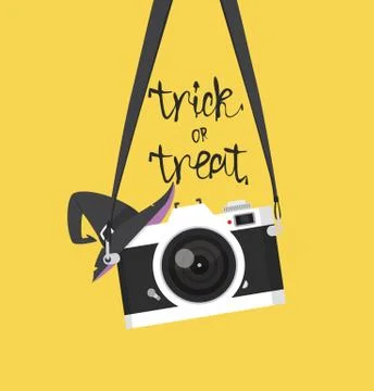 Vintage camera hanging with witch hat Halloween Stock Illustration