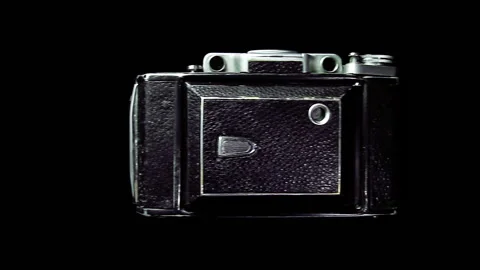Vintage camera shooting Stock Footage 100647357
