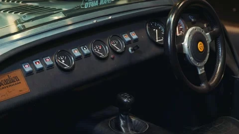 Vintage car dashboard panel showing steering wheel and gear shift interior Stock Footage 340880000