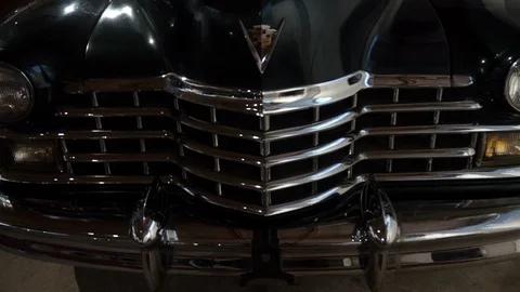 Vintage car front end closeup. Cadillack logo and mask. Stock Footage 118619527